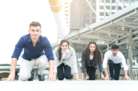 Businessman and woman ready on starting point and look at goal successful and achievement cooperate...