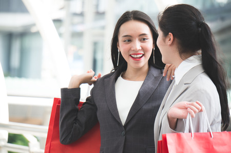 Businessman feeling stress and headache in city outdoorの写真素材