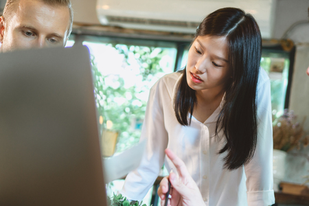 Casual business woman meeting and sharing idea to colleagueの写真素材