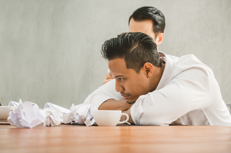 Sales man stress because he cannot meet target of this monthの写真素材