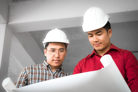Engineer and foreman meeting on siteの写真素材