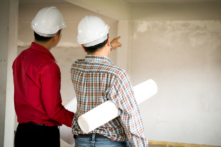 Engineers inspect building work at siteの写真素材