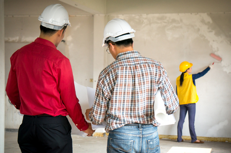 Engineers inspect building work at siteの写真素材