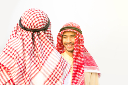 Arab businessman meet and greet with colleagueの写真素材