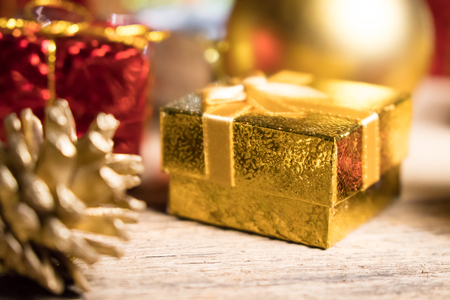 Gold present with decoration background with space for Christmas celebration for happy new year 2018の写真素材