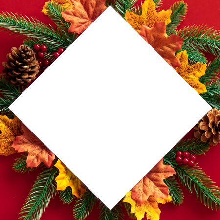 Frame for christmas festival concept with copy space and decoration, pine cones, pine branchs and mapleの写真素材