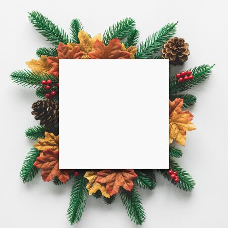 Frame for christmas festival concept with copy space and decoration, pine cones, pine branchs and mapleの写真素材