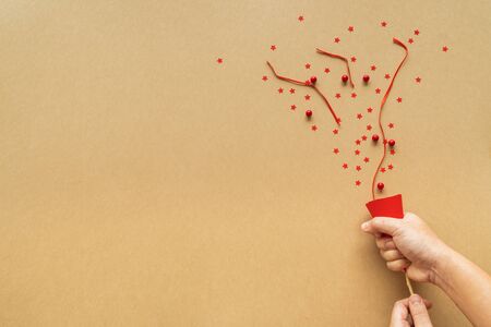 Christmas background with paper snow flake and christmas gifts on paper. Flat lay, top view.の写真素材