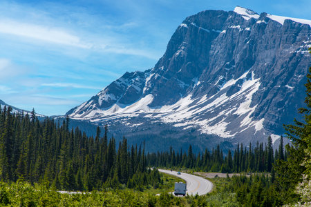 Road trip with a great view of big mountain and blue sky in Alberta, Canada.の写真素材
