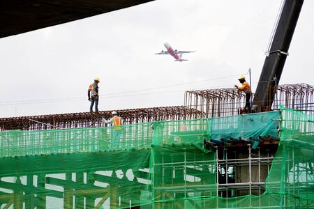 Worker on construction site in the morningのeditorial素材