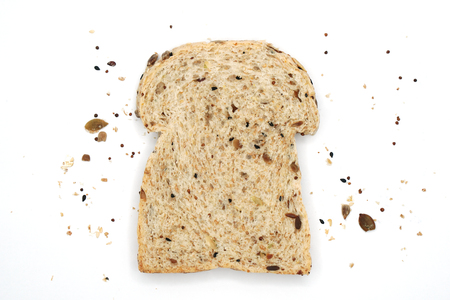 19 Grains Wheat Loaf  and crumbs isolated on white backgroundの写真素材