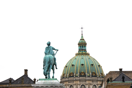 Copenhagen, Denmark - April 17, 2018: Frederik V of Denmark statue at Copenhagen's Amalienborg or Royal Palace courtyard with dome of Marble church (Frederik's Church) behind in Copenhagen, Denmarkのeditorial素材