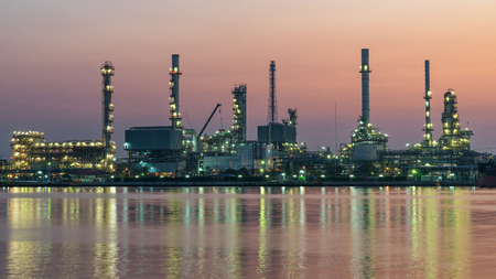 river side oil refinery industry plant along twilight morning,pink skyの写真素材
