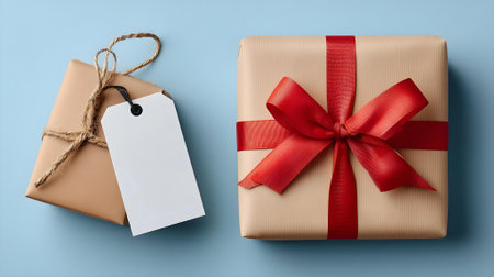 Gift box with tag on blue background. Top view with copy space.ai generatedの素材