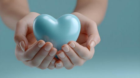 Blue heart in female hands on a blue background. 3d rendering.ai generatedの素材