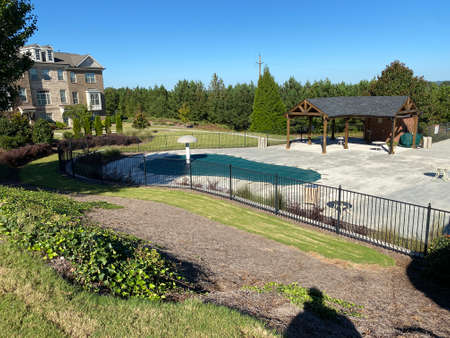 Unseen fountains, dry land and the landscape of houses.の写真素材