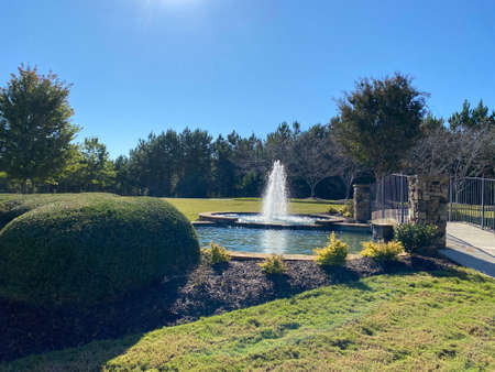 Beautiful fountains and round grassの写真素材