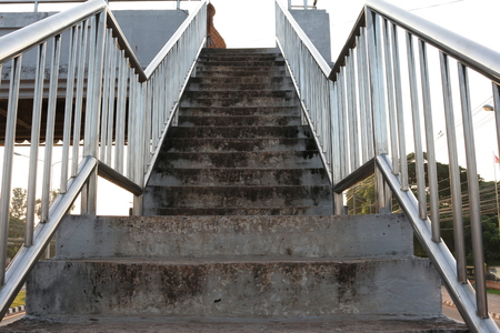 Old stairs of the overpass in the cityの写真素材