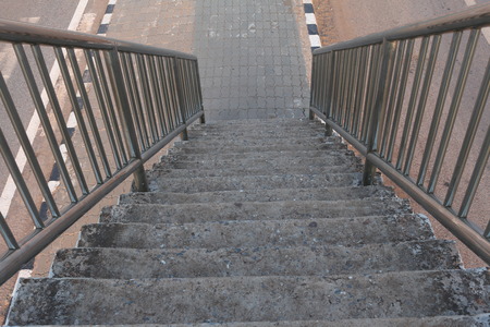 Old stairs of the overpass in the cityの写真素材