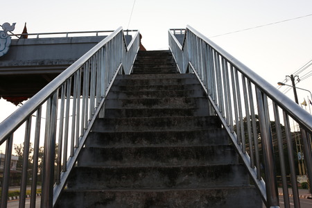 Old stairs of the overpass in the cityの写真素材