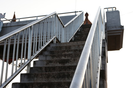 Old stairs of the overpass in the cityの写真素材