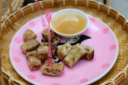 Thai dessert Grilled bananas from natural wood charcoal Snacksの写真素材
