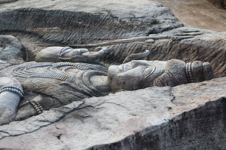 Carving in buddhist temple cave phadan, sakonnakhon,Thailandの写真素材