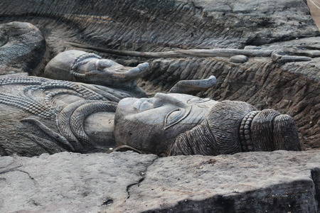 Carving in buddhist temple cave phadan, sakonnakhon,Thailandの写真素材