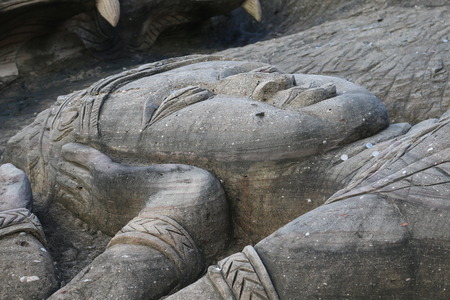 Carving in buddhist temple cave phadan, sakonnakhon,Thailandの写真素材