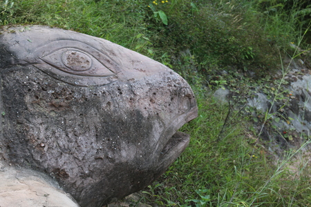 Carving in buddhist temple cave phadan, sakonnakhon,Thailandの写真素材