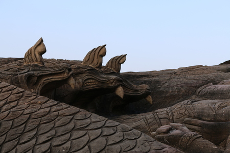 Carving in buddhist temple cave phadan, sakonnakhon,Thailandの写真素材