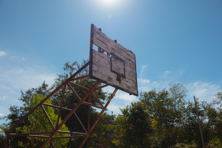 Basketball hoop is broken and wood board damaged ,Shiny wooden basketballの写真素材
