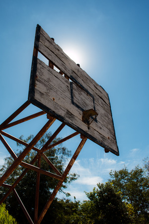 Basketball hoop is broken and wood board damaged ,Shiny wooden basketballの写真素材