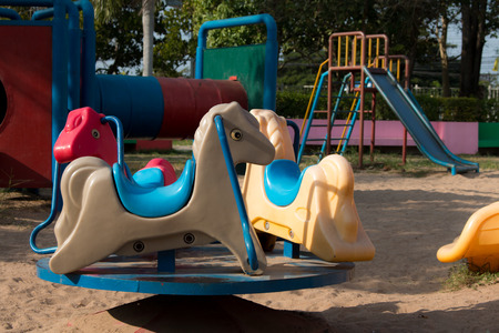 Spring See Saw in the park  rocking  Horse  to  playgroundの写真素材