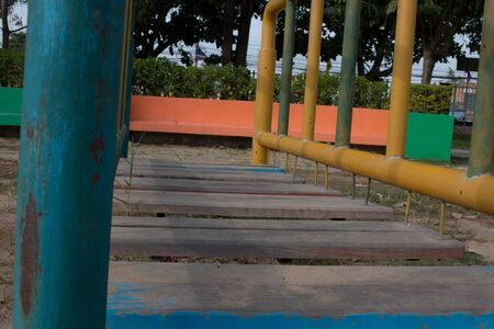 Climbing  fun playing on equipment at a playground.の写真素材