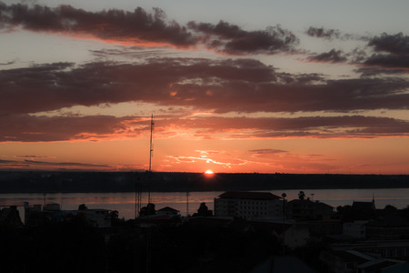 Sunrise over Mekong River in a Mukdahan city skylinの写真素材