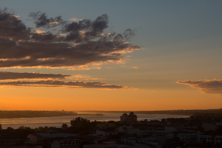 Sunrise over Mekong River in a Mukdahan city skylinの写真素材
