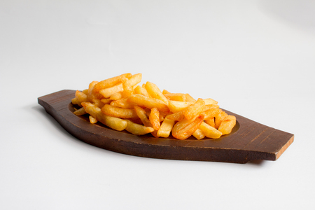 French fries on a wooden trayの写真素材