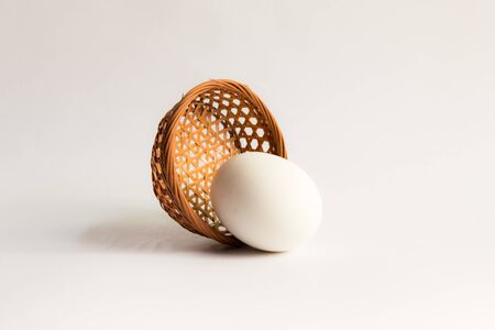 egg in basket wicker on white background,Duck eggs in baskets .の写真素材