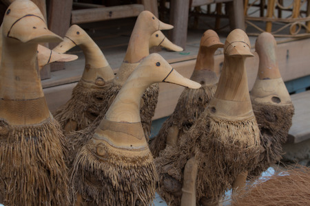 Beautiful wooden carved turtles , cats, birds .の写真素材