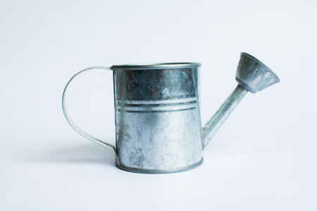 metal watering can isolated on white background,Watering Can miniatureの写真素材