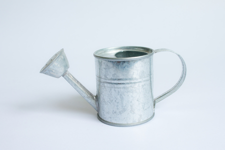 metal watering can isolated on white background,Watering Can miniatureの写真素材
