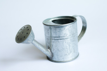 metal watering can isolated on white background,Watering Can miniatureの写真素材