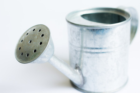metal watering can isolated on white background,Watering Can miniatureの写真素材