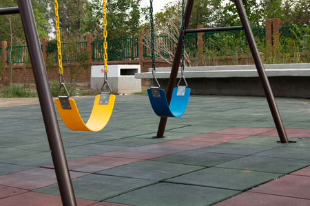The swings in the playgroundの写真素材