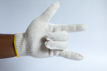 Hand in glove, symbolic White background