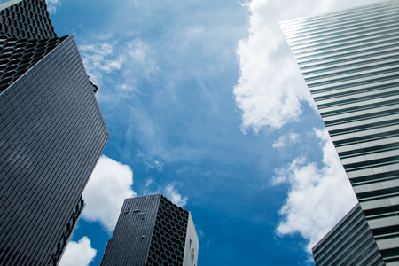 High-rise buildings and blue skyの写真素材