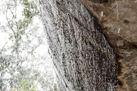 landscape waterfall on the rocksの写真素材