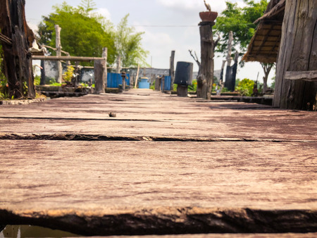 Old wooden bridge across the water.の写真素材