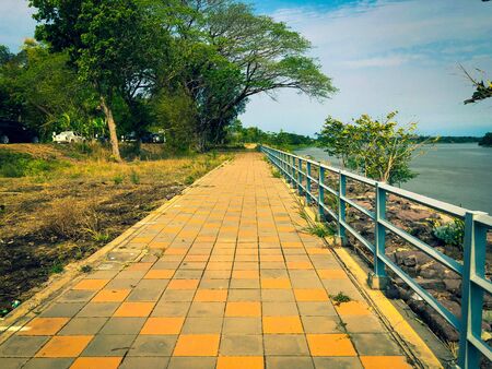 Walking walkway with guard rail
